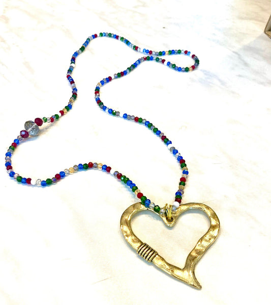 31. Collar lariat en cristal y colgante corazón