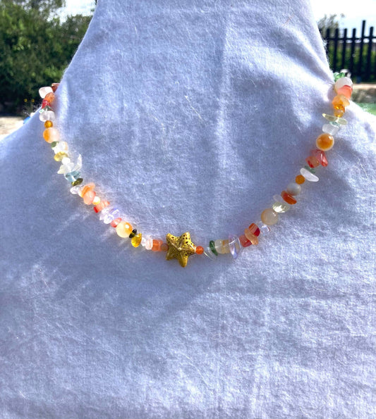1. Collar matiné cuentas cristal naranja y estrella